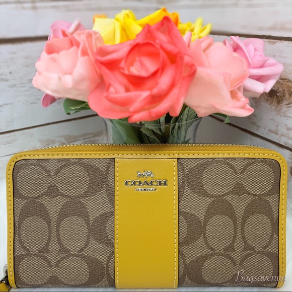 Coach Handbags - Coach signature zip wallet khaki flax pvc leather